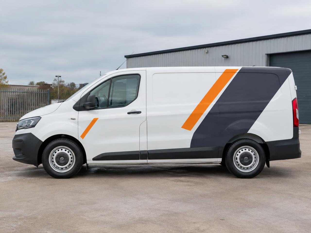 White panel van with charcoal and orange diagonal livery graphics